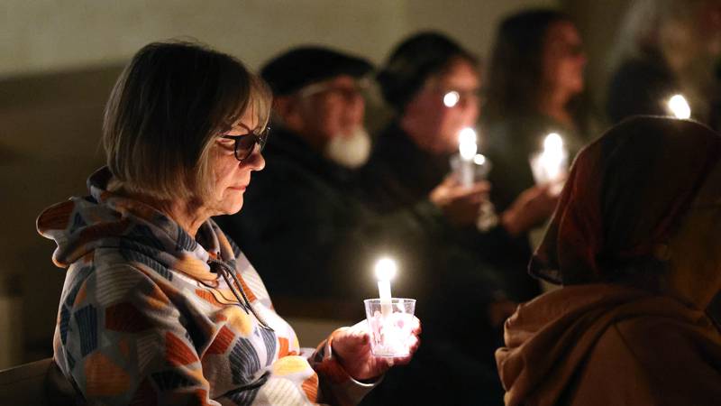 Dozens seek to regain hope at ‘Vigil for Peace’ in DeKalb 