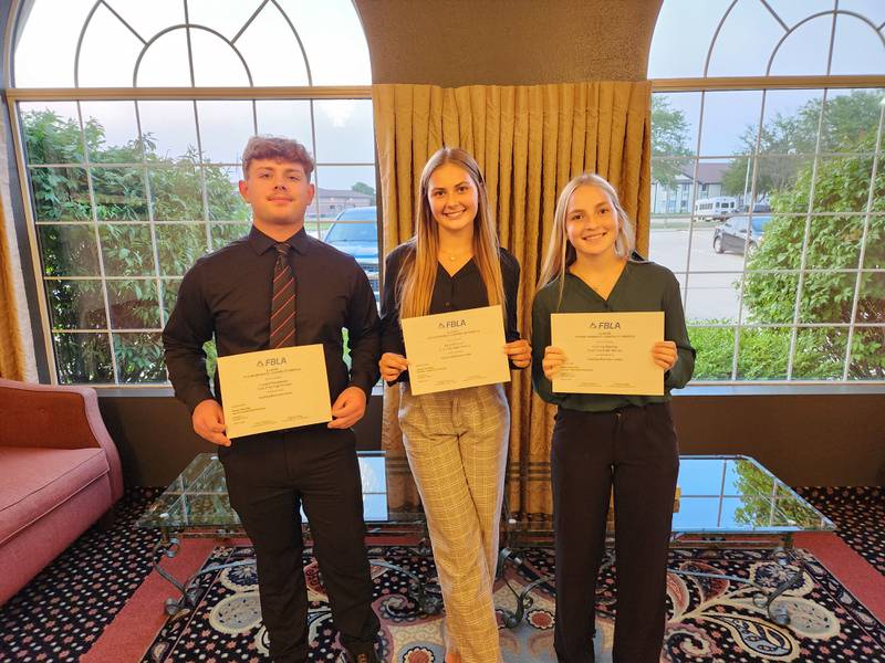Four members of Coal City’s chapter of Future Business Leaders of America  were awarded Aspiring Business Leader Scholarships at the recent FBLA Summer Leadership Workshop. Recognized for their leadership potential were (from left): Lucas Pfitzenmaier, Kylee Kennell and Corinna Barkley. Not pictured is  Dylan Young.
