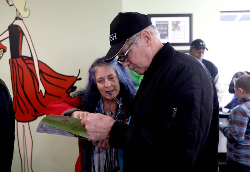 Chris (left) and Chuck Nadr of North Aurora peruse the menu while in line at the new Chicken Salad Chick franchise during the store’s grand opening at 220 N. Randall Rd. in Batavia on Tuesday, Jan. 10, 2023.