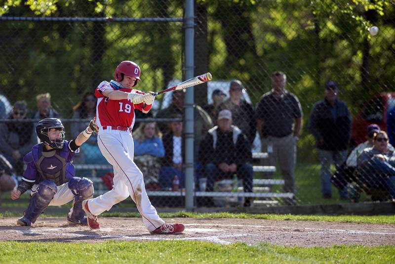 Oregon’s Miley Smith drives the ball to right field for an rbi Tuesday against Dixon.