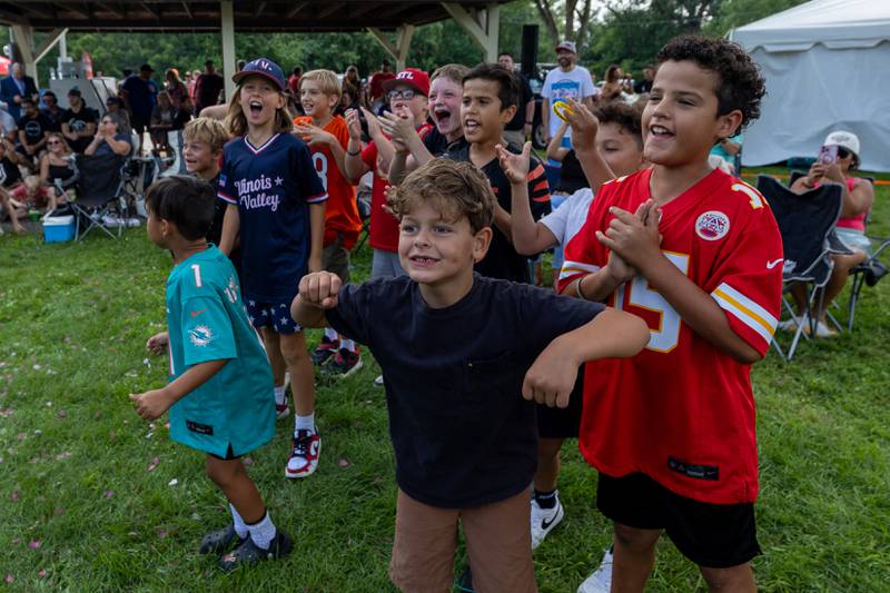 DreamWave fans cheer at the Taste of the Illinois Valley DreamWave Wrestling event on Saturday, August 2, 2025 at Centennial Park in Peru.