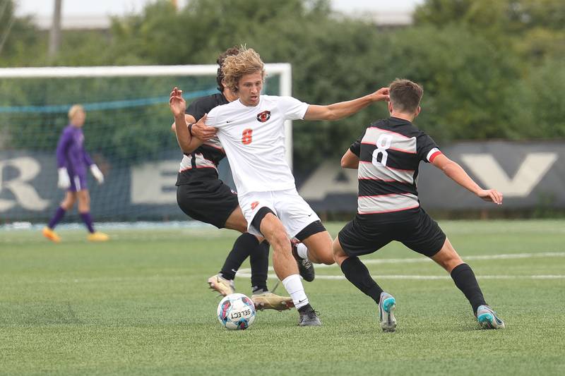 Lincoln-Way West’s Eli Bach works the ball against Lincoln-Way Central in the Windy City Classic at Revis High School in Burbank on Saturday, Aug. 26, 2023.