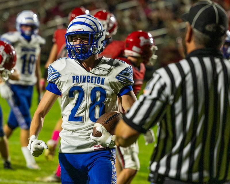 Ayden Agushi (28) of Princeton celebrates after scoring touchdown on Friday, Oct. 3, 2025 at Richard Nesti Stadium in Spring Valley.