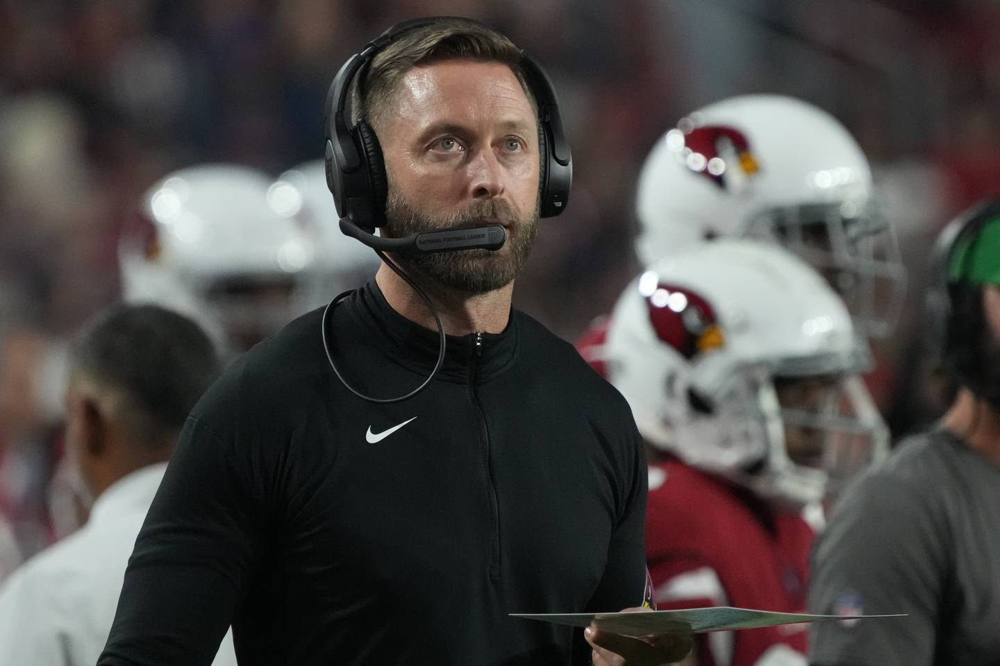 Arizona Cardinals head coach Kliff Kingsbury calls out the play during the first half of an NFL football game against the New England Patriots, Monday, Dec. 12, 2022, in Glendale, Ariz. (AP Photo/Rick Scuteri)