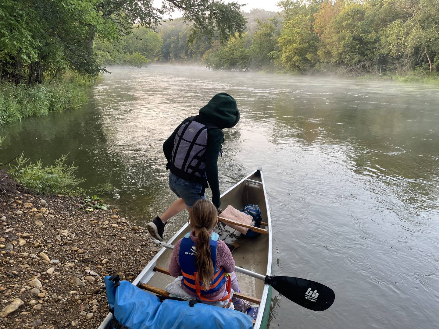 Jenni Schiavone canoes down the length of the Fox River Sept. 9-18 to support the Friends of the Fox' efforts to preserve and clean up the river; here, Schiavone, out of the frame, takes her two daughters, Greta and Scarlet, along the river between Algonquin and Carpentersville on Wednesday, Sept. 14.