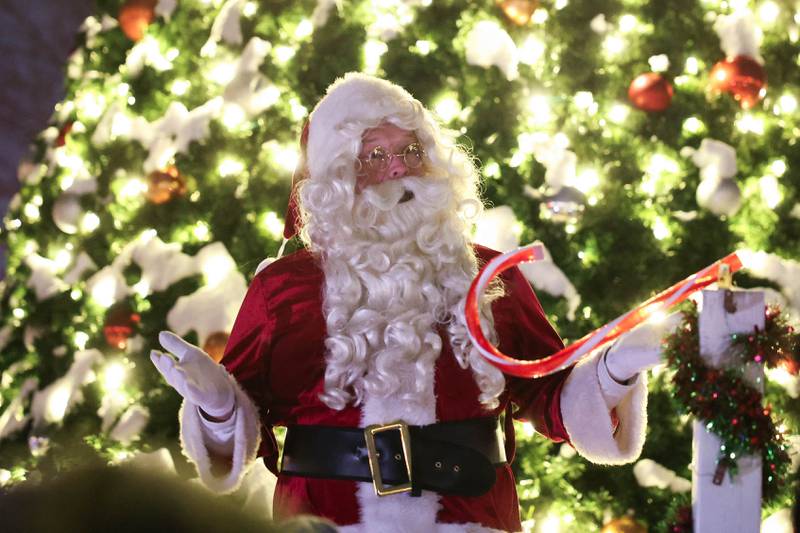 Santa talks to the crowd of children at Plainfield’s holiday kickoff Grinchmas on the Green on Saturday, Dec. 5, 2025 in Plainfield.
