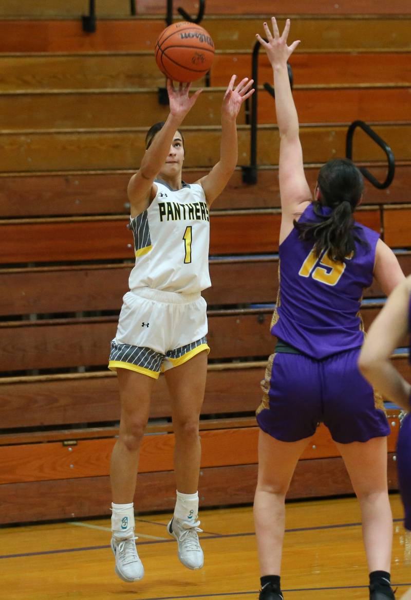 Putnam County's Ava Hatton shoots a jump shot over Mendota's Grace Wasmer during the Princeton High School Lady Tigers Holiday Tournament on Tuesday, Nov. 14, 2023 in Prouty Gym.
