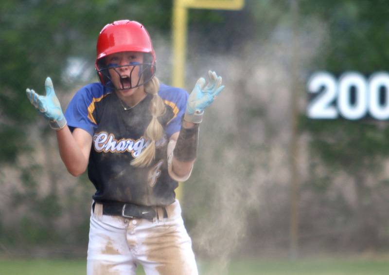 Aurora Central Catholic’s Grace Grunloh celebrates arriving safely at third base against Marengo in varsity girls softball IHSA Class 2A Regional Title Game action on Friday, May 22, 2026 at Raymond Benoy Field on the campus of Marian Central High School in Woodstock.