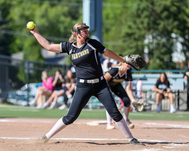 Glenbard North's Alyssa Abderhalden (13) is tagged out at the plate by St Charles North's Sophia Olman (10) during the Class 4A Glenbard West Regional Final softball game between Glenbard North at St Charles North.  May 26, 2023.