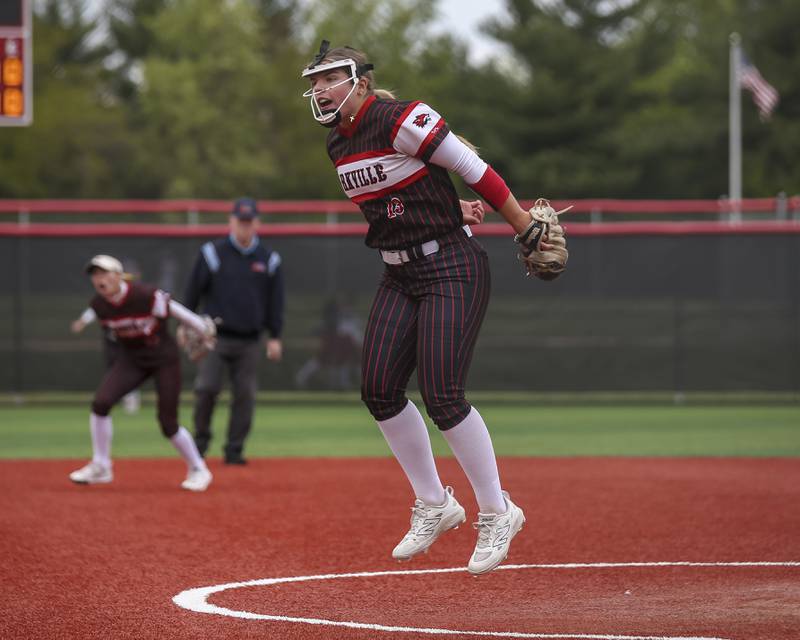 Yorkville's Ellie Fox (13) celebrates getting the third out to get out an early jam during softball game between Oswego at Yorkville. May 5, 2026 in Yorkville.