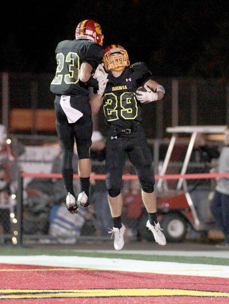 Batavia's Matthew Huizinga (right) and Thomas Stuttle celebrate one of Huizinga's two touchdowns on Sept. 30 during a home game against Geneva.