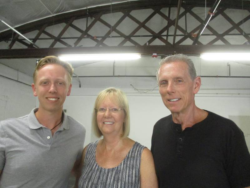 Ed Williams, right, wife Karin and son Mike are The Williams Group, the Yorkville development firm planning to bring a brewery and taproom to their building at 101 S. Bridge St.