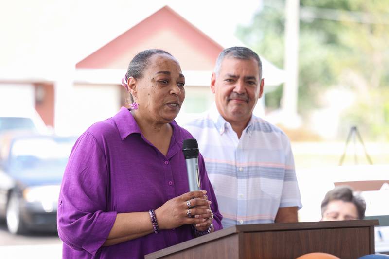 Kankakee 5th Ward Alderwoman Carmen Lewis speaks alongside 5th Ward Alderman Victor Nevarez during the West Harbor Residences ribbon cutting and street dedication ceremony on Wednesday, July 23, 2025.