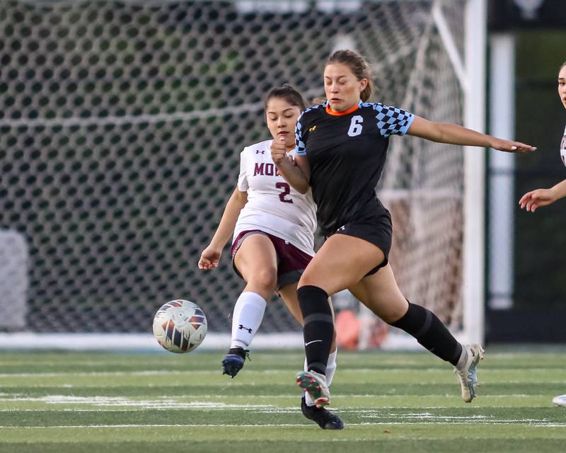 Willowbrook's Emily Barth (6) challenges Morton's Crystal Ozuna (2) during soccer match between Morton at Willowbrook.  April 15, 2024.