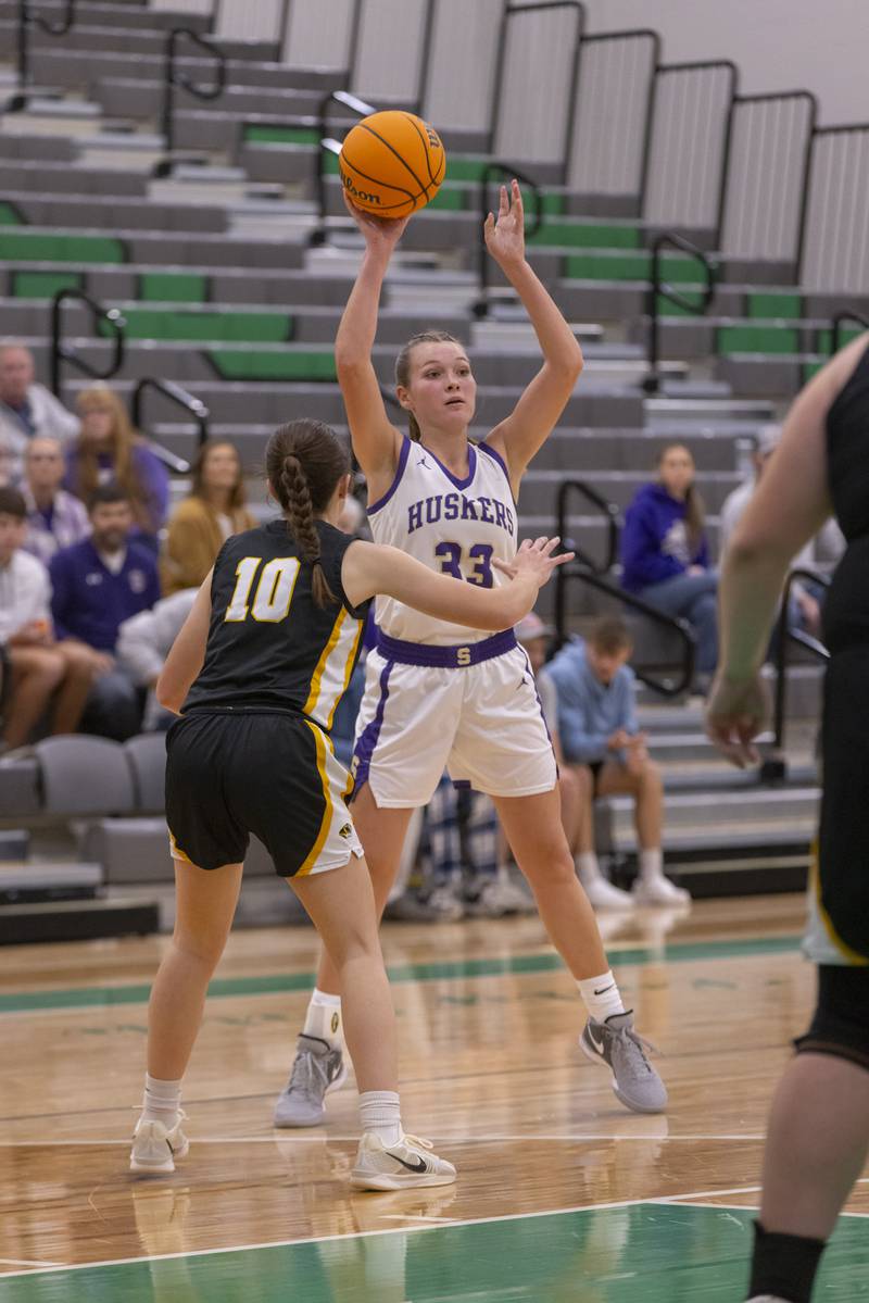 Jenna Setchell of Serena High School looks for a teammate to pass to across court in the game against Herscher High School during the Falcon-Irish Girls Basketball Tournament on November 19, 2024 at Seneca High School.