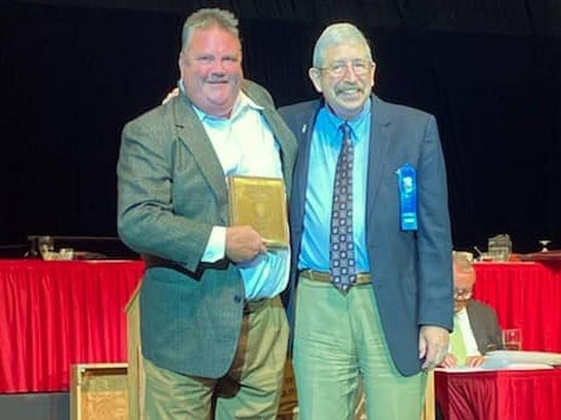 Chuck Feldmann (left) and former Dundee-Crown boys basketball coach Bruce Firchau, at Feldmann's 2020 induction into the Illinois Basketball Coaches Association Hall of Fame as a friend of basketball.