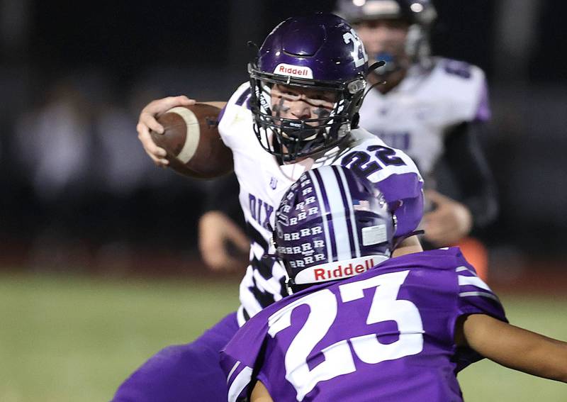 Dixon’s Aiden Wiseman tries to get by Rochelle’s Aidan Rodriguez during their first round playoff game Friday, Oct. 28, 2022, at Rochelle High School.