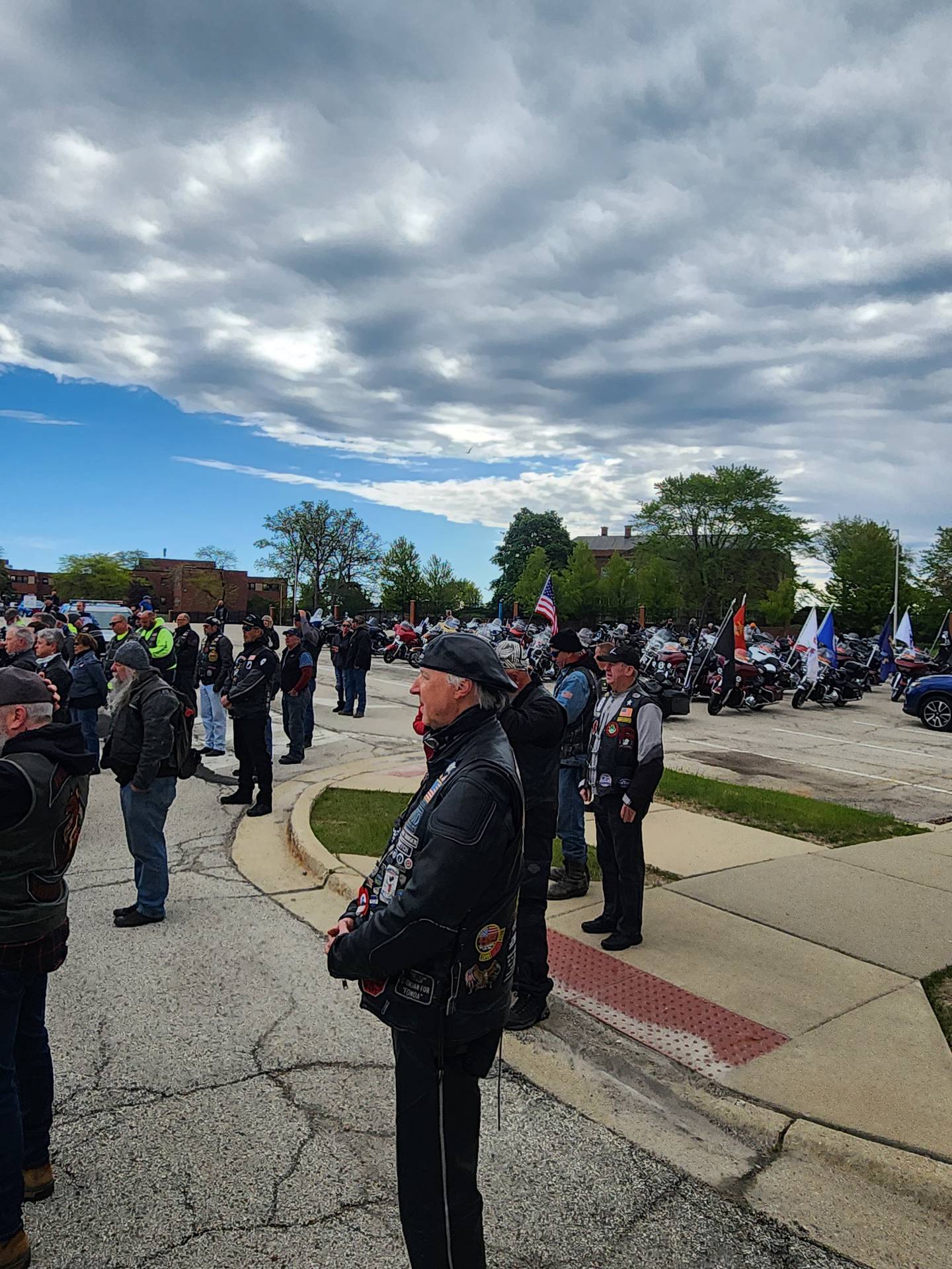 With their motorcycles awaiting in the staging area, participants in the 2025 Mid-America Ride for Freedom look on as speakers lead the opening ceremony. This year’s POW/MIA awareness ride takes place Sunday, May 24.