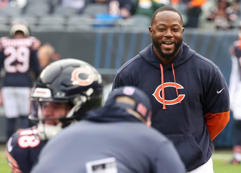 New Chicago Bears offensive coordinator Thomas Brown watches Bears quarterback Caleb Williams take some snaps before the they play the Packers Sunday, Nov. 17, 2024, at Soldier Field in Chicago.