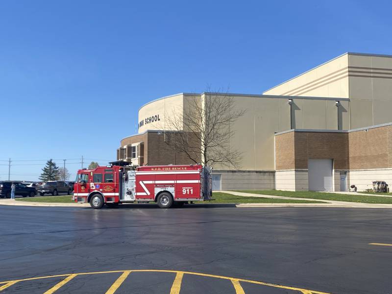 A fire truck sits outside Kaneland High School in Maple Park on May 3, 2023 after a small fire was reported in a bathroom. All students and staff were evacuated, and classes were canceled for the rest of the day.
