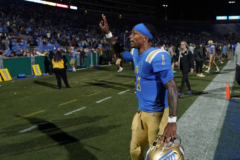 UCLA quarterback Dorian Thompson-Robinson (1) celebrates after a win over Washington during an NCAA college football game Friday, Sept. 30, 2022, in Pasadena, Calif. (AP Photo/Marcio Jose Sanchez)
