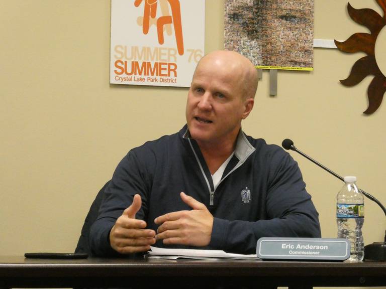 Crystal Lake Park District Commissioner Eric Anderson addresses dozens of community members who petitioned the park district during their meeting on Thursday, Nov. 17, 2022, to look into purchasing the Northwestern Medicine gym due to close at the end of the year.