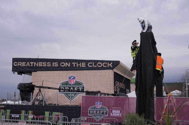 Workers prepare the venue ahead of the NFL football draft Wednesday, April 23, 2025, in Green Bay, Wis. (AP Photo/Jeff Roberson)