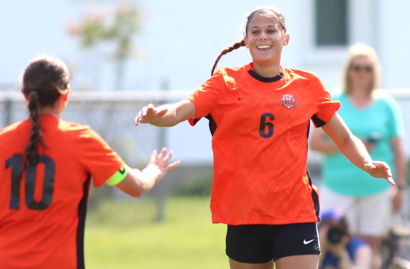 Crystal Lake Central’s Ella Bechler, right, is greeted by Addison Schaffer, left, after a Bechler goal against Hononegah in IHSA Class 2A Sectional Semifinal girls soccer on Monday, May 25, 2026 at Crystal Lake Central High School in Crystal Lake.