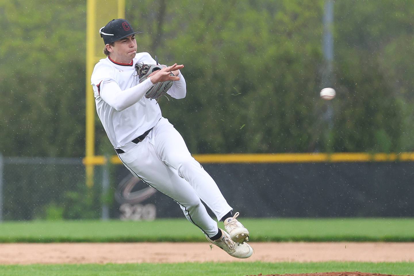 Lincoln-Way Central’s Desmond Gill makes a throw to first against Lockport on Thursday, April 30, 2026 in Joliet.