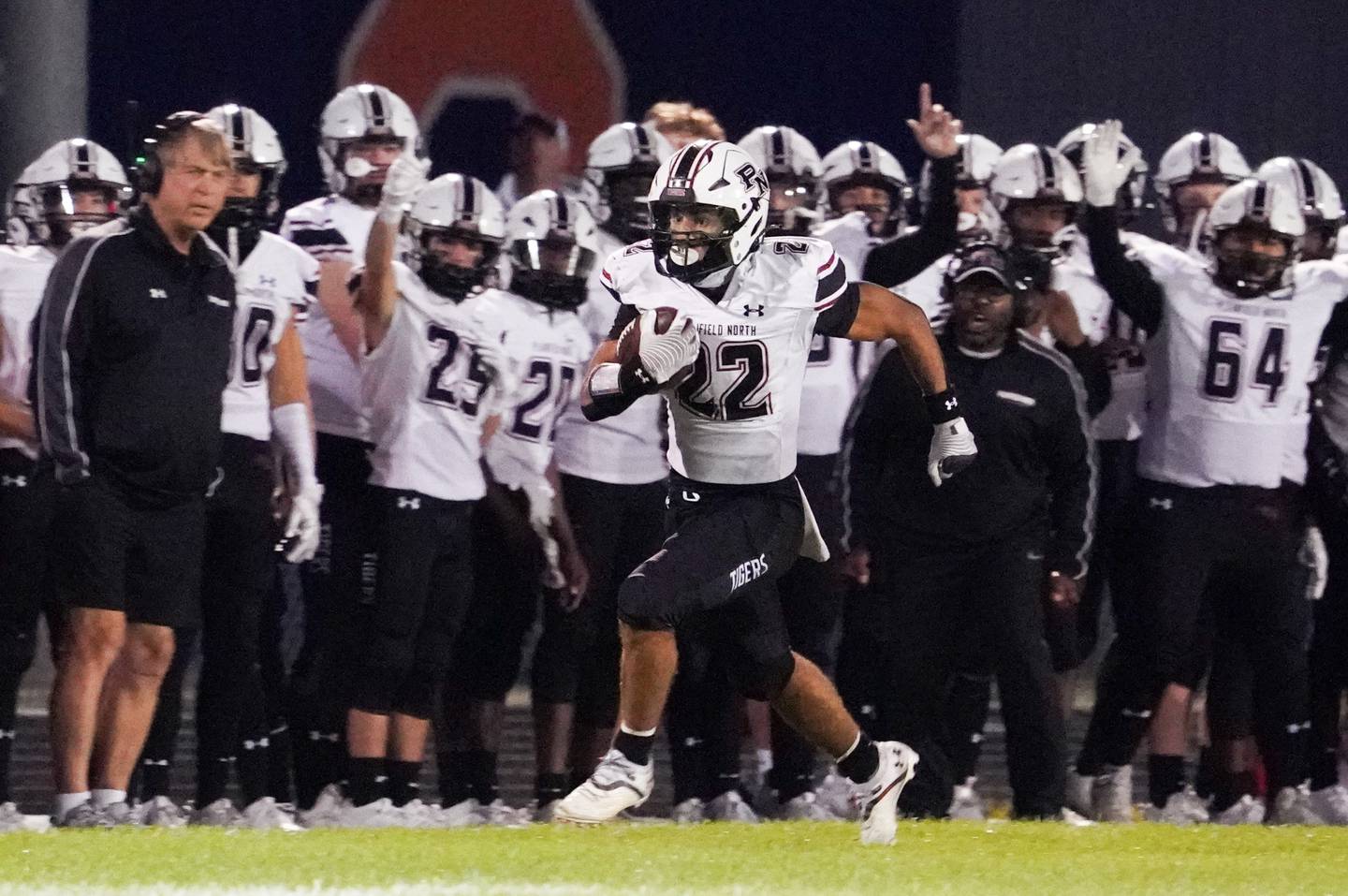 Plainfield North's Malik Jassim (22) runs after the catch against Oswego during a football game at Oswego High School on Friday, Sept. 27, 2024.