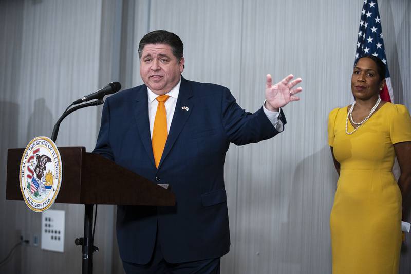 Illinois Gov. J.B. Pritzker answers questions from the media during a press conference at the Marriott Marquis Hotel in Chicago, Wednesday, Nov. 9, 2022. (Anthony Vazquez/Chicago Sun-Times via AP)
