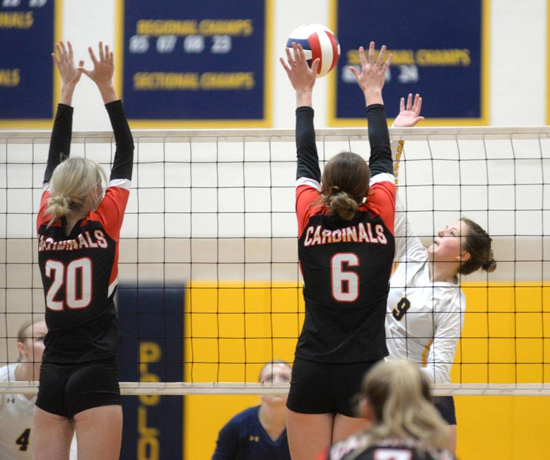 Polo's Reese Mekeel (9) spikes as Forreston's Drew Behrends (20) and Breelyn Schneiderman (6) try to block on Wednesday, Aug. 28, 2024 st Polo High School.