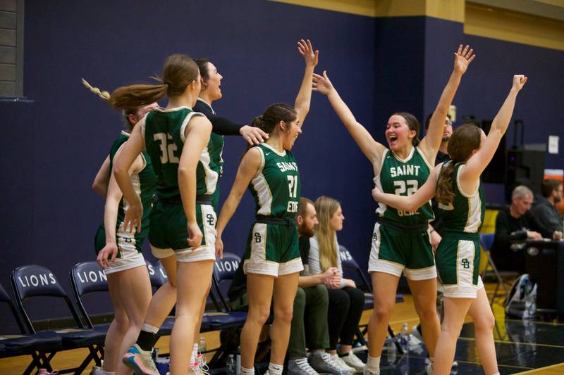 St. Bede celebrates the win over Ida Crown at the Class 1A Girl's Basketball  Super Sectional on Monday , Feb.26, 2024 at Harvest Christian Academy  in Elgin.