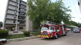 Photos: Fire departments respond to fire at Peru high-rise