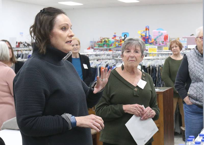 Amy Murphy (left) store manager at the Princeton Closet, speaks before handing out their annual Lending a Hand funds totaling $202,000 to 44 community programs or projects on Wednesday, Jan. 8, 2025 at The Princeton Closet in Princeton.