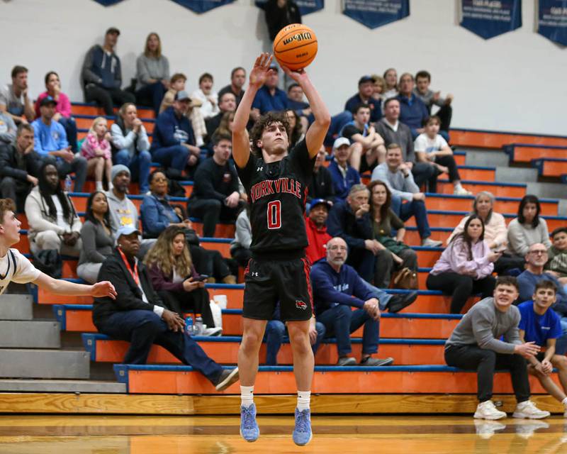 Yorkville's Gabe Sanders (0) shoots a three pointer during their Class 4A Naperville North Regional final basketball game between Yorkville at Downers Grove South, Feb 27, 2026 in Naperville.