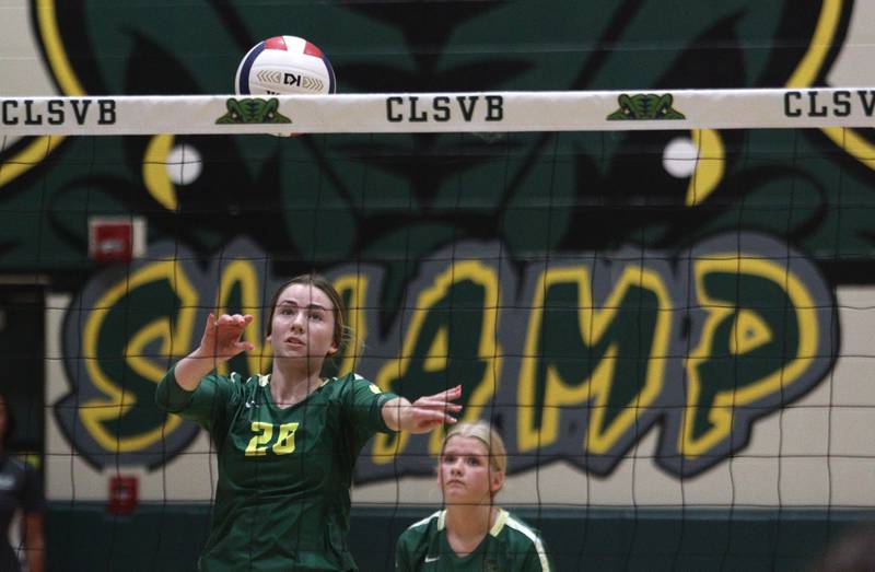 Crystal Lake South’s Morgan Johnson plays the ball against Prairie Ridge in varsity volleyball at Crystal Lake South Tuesday night.