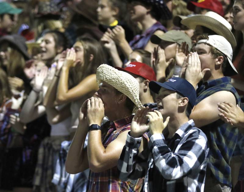 Marian Central fence cheer during a non-conference football game Friday, Sept. 2, 2022, between Marian Central and Johnsburg at Marian Central High School.