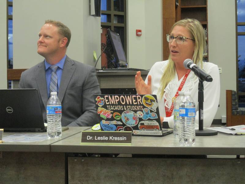 Yorkville School District 115 K-8 Teaching and Learning Coordinator Leslie Kressin, right, outlines plans for a full-day kindergarten program starting with the 2022-23 school year, at the April 25, 2022 school board meeting. At left is Kessin's elementary instruction administrative colleague Nate Campbell. (Mark Foster -- mfoster@shawmedia.com)