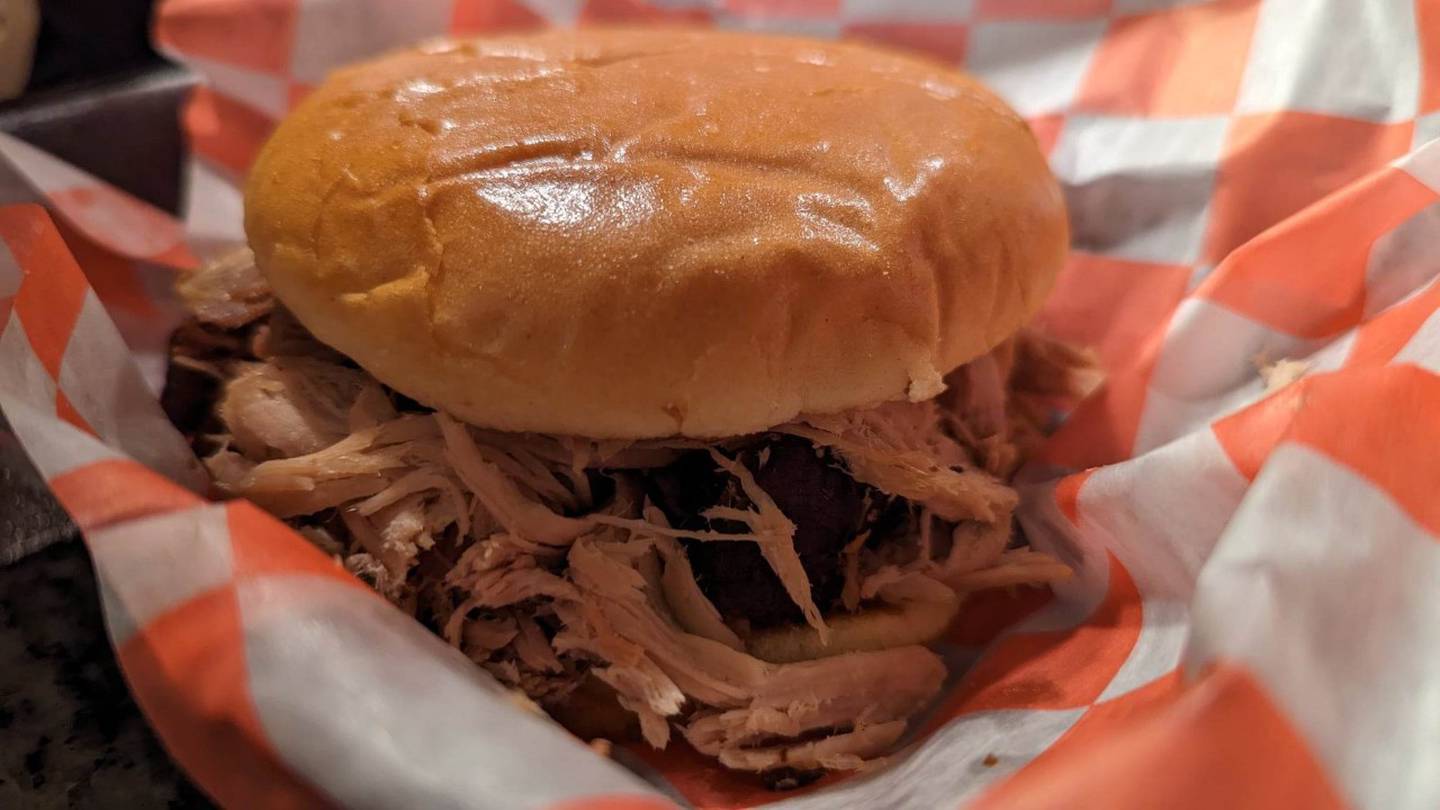 Pictured is the pulled pork sandwich from Firewater BBQ in Crest Hill,