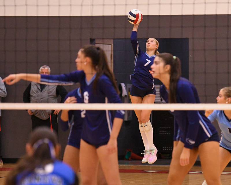 Nazareth Academy's Lexi Van Eekeren (7) serves the ball during the sectional title game against Geneva on Thursday Nov. 6, 2025, held at Timothy Christian High School.