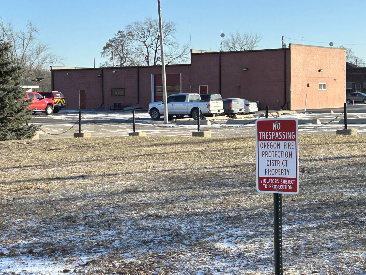 The Oregon Fire Station sits on a portion of property owned by the Oregon Fire Protection District. Shown here is the back of the fire station at 100 W. Washington St.  The district owns property to the west and south of the station that is located on the west bank of the Rock River.