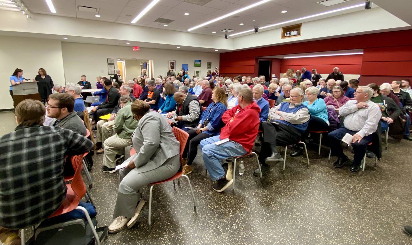 A crowded Yusunas Room at the DeKalb Public Library, 309 Oak St., waits for election forums to begin on Sunday, March 9, 2025, at the event hosted by WNIJ radio and the DeKalb Election Group.