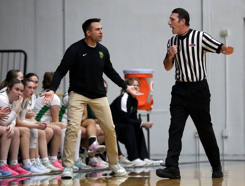 Crystal Lake South Head Coach Mark Mucha argues a call with the referee during the Northern Illinois Holiday Classic Championship girl basketball game on Thursday, Dec. 18, 2025, at McHenry High School.