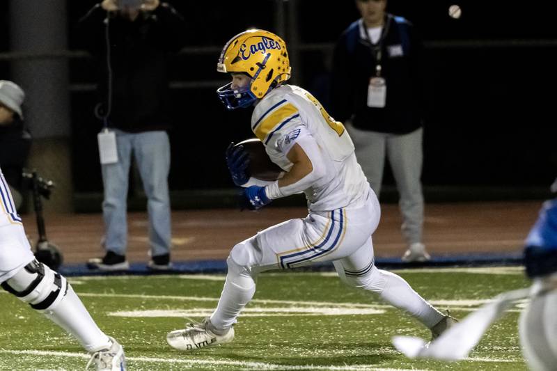 Sandburg's Luke Basiorka looks for an opening during a varsity football game against Lincoln-Way East at Lincoln-Way East on Oct. 23, 2025.