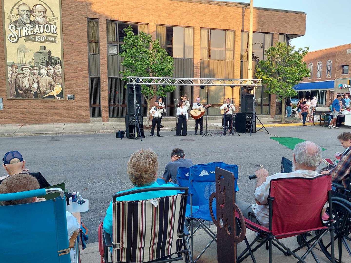 Tecalitan y Nora perform Friday, July 26, 2024, during the Jammin' at the Clock on Monroe Street along Heritage Park in Streator.