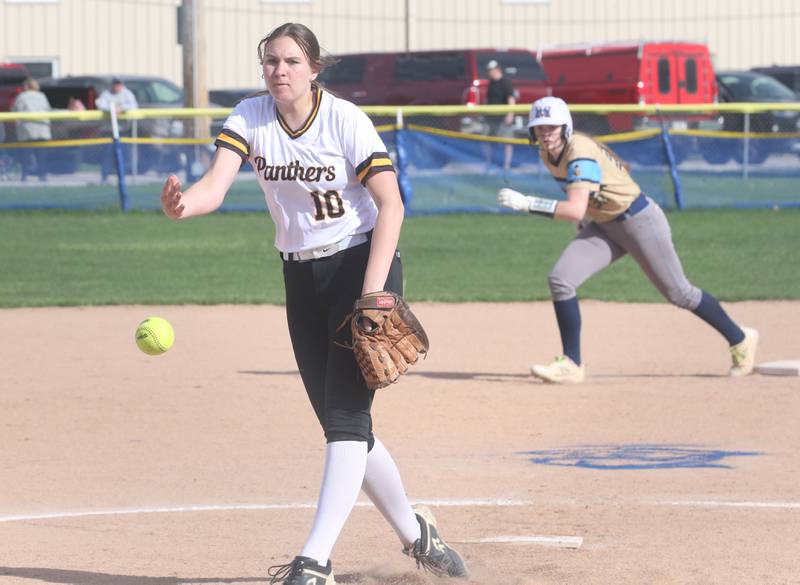Putnam County pitcher Myah Richardson lets go of a pitch as Marquette's Kelsey Cuchra steps away from the bag on Tuesday, April 29, 2025 in Ottawa.