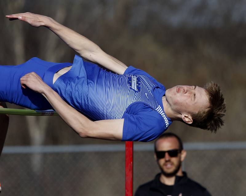 Woodstock’s Jack Novelle competes in the high jump Thursday, April 21, 2022, during the McHenry County Track and Field Meet at Richmond-Burton High School.