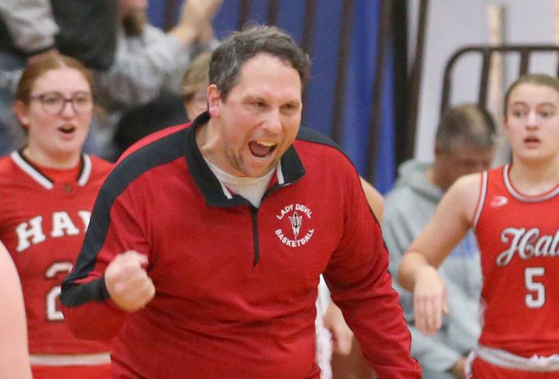 Hall head girls basketball coach TJ Orlandi reacts after player Charlie Pellegrini sinks a three point basket against Princeton during the Princeton Holiday Girls Basketball Tournament on Friday, Nov. 23, 2024 at Princeton High School.