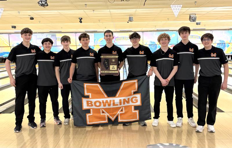 The Minooka High boys bowling team assembles with its newly won regional championship plaque Friday, Jan. 16, 2026, at Illinois Valley Super Bowl in Peru.